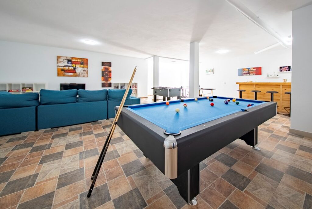 Villa Lomas games room with pool table, table tennis and table football