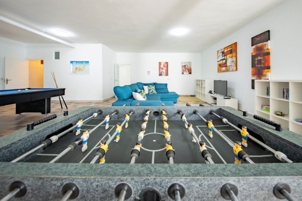Villa Lomas games room with pool table, table tennis and table football