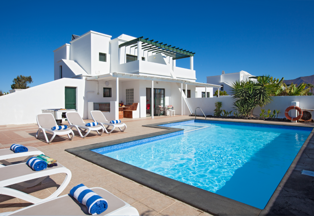 Villa Vicini pool area with sun loungers